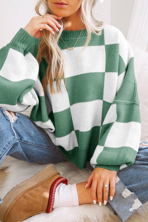 Pull à carreaux avec manches tendance : le style dans les détails