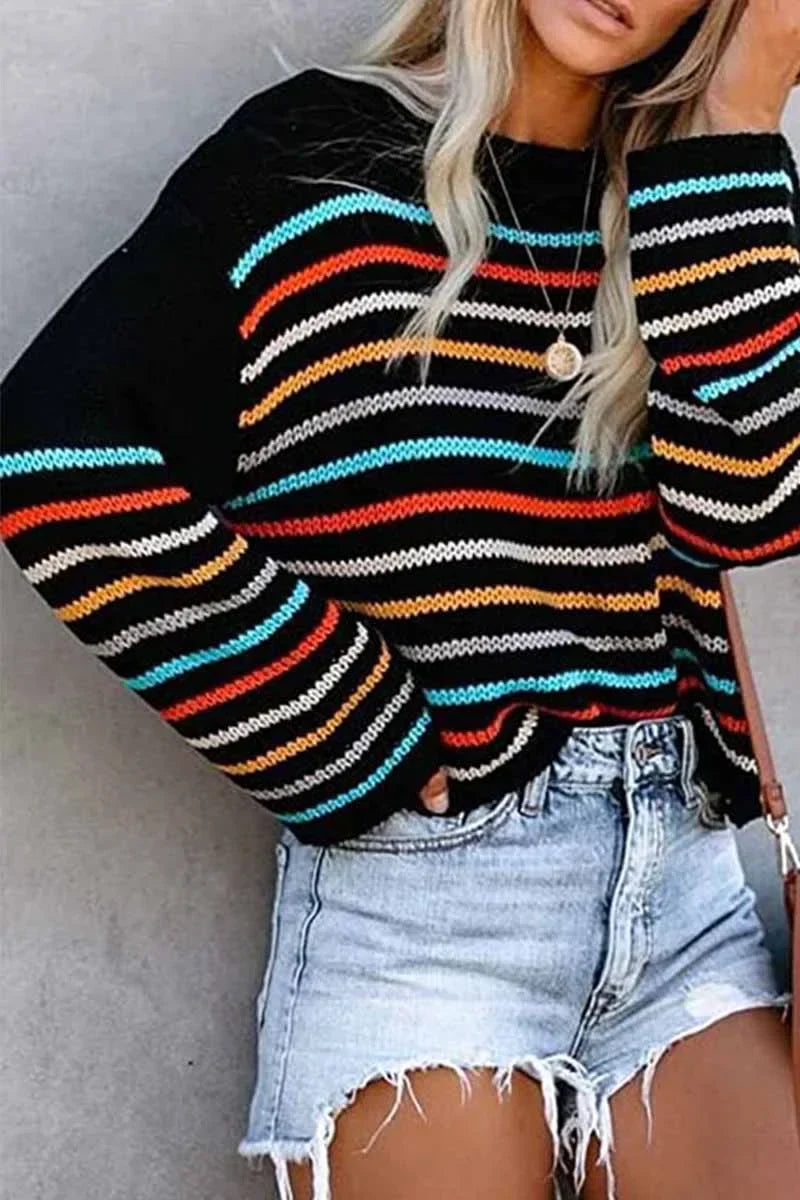 Pull élégant avec motif coloré et design épaules dénudées