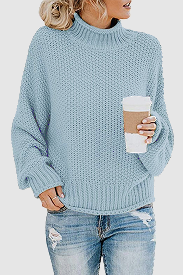 Pull douillet avec patchwork intéressant et col montant