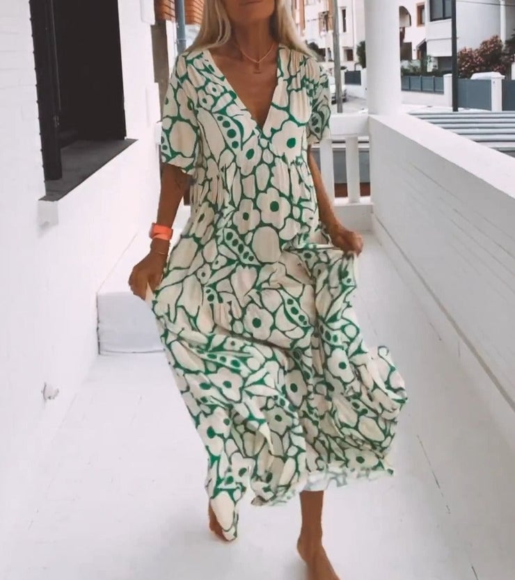 Robe midi élégante avec encolure en V et motif subtil