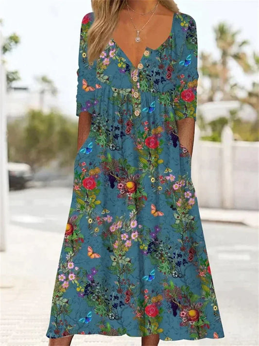 Natalie - Robe longue plissée à motif floral