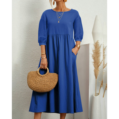 Robe d'été élégante avec veste de soirée et détails romantiques