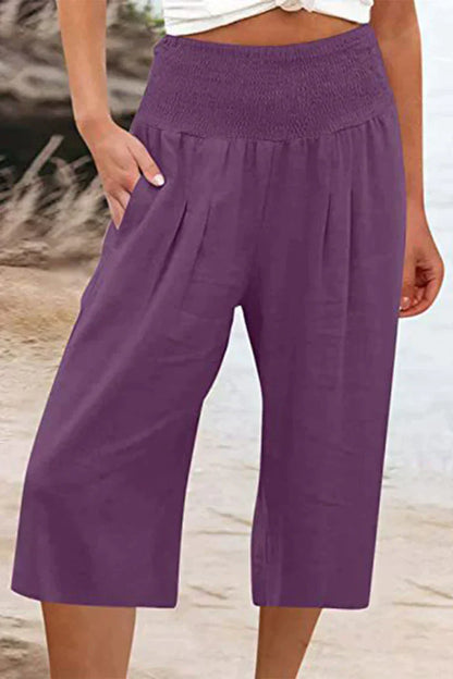 Pantalon uni uni avec taille haute et jambes larges, mi-longueur
