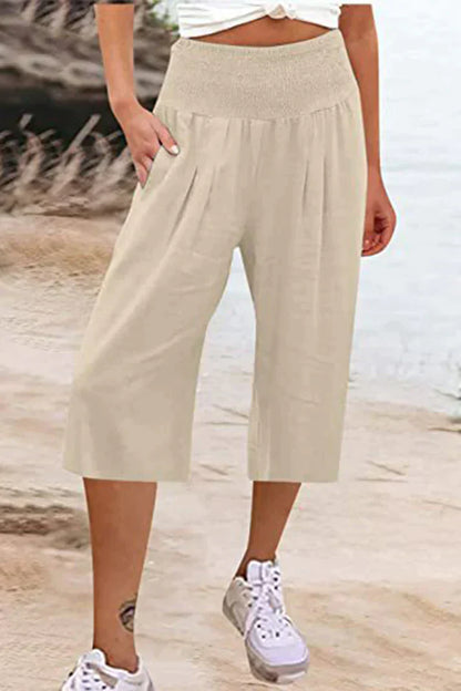 Pantalon uni uni avec taille haute et jambes larges, mi-longueur