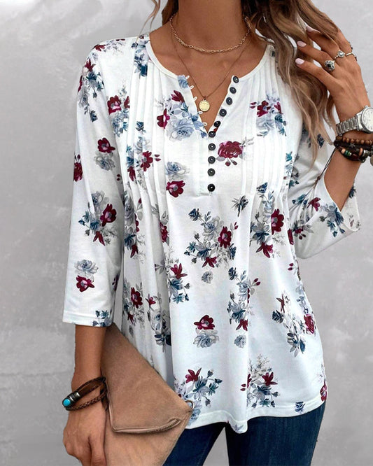 Blouse élégante avec boutons-pression floraux