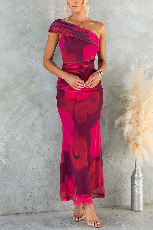 Robe longue asymétrique avec imprimé floral élégant
