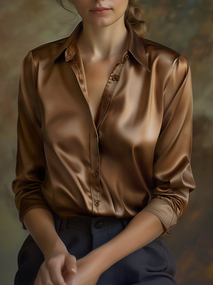 Elégante blouse en satin noir à manches longues