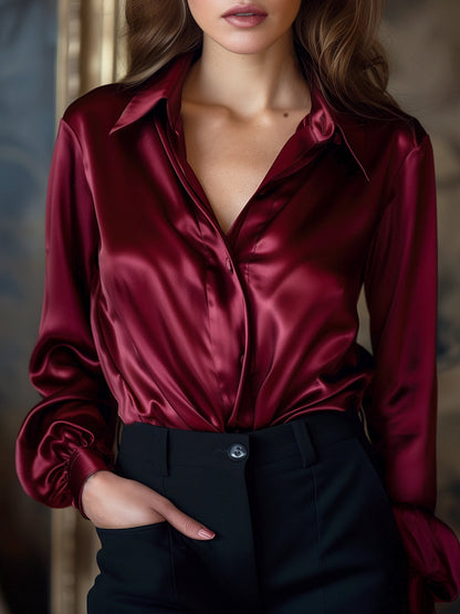 Elégante blouse en satin noir à manches longues