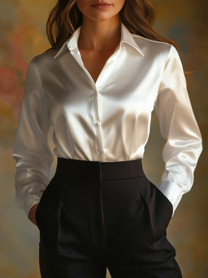 Elégante blouse en satin noir à manches longues
