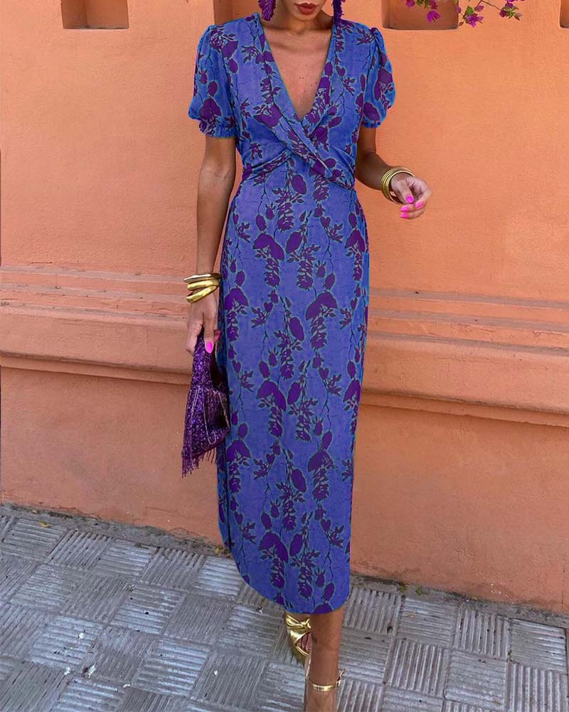 Robe midi à imprimé floral et encolure en V, idéale pour toutes les occasions.