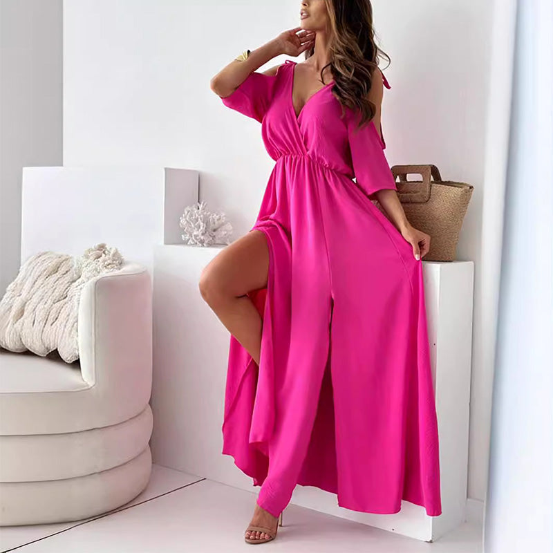 Robe longue élégante avec encolure croisée et fente latérale fluide