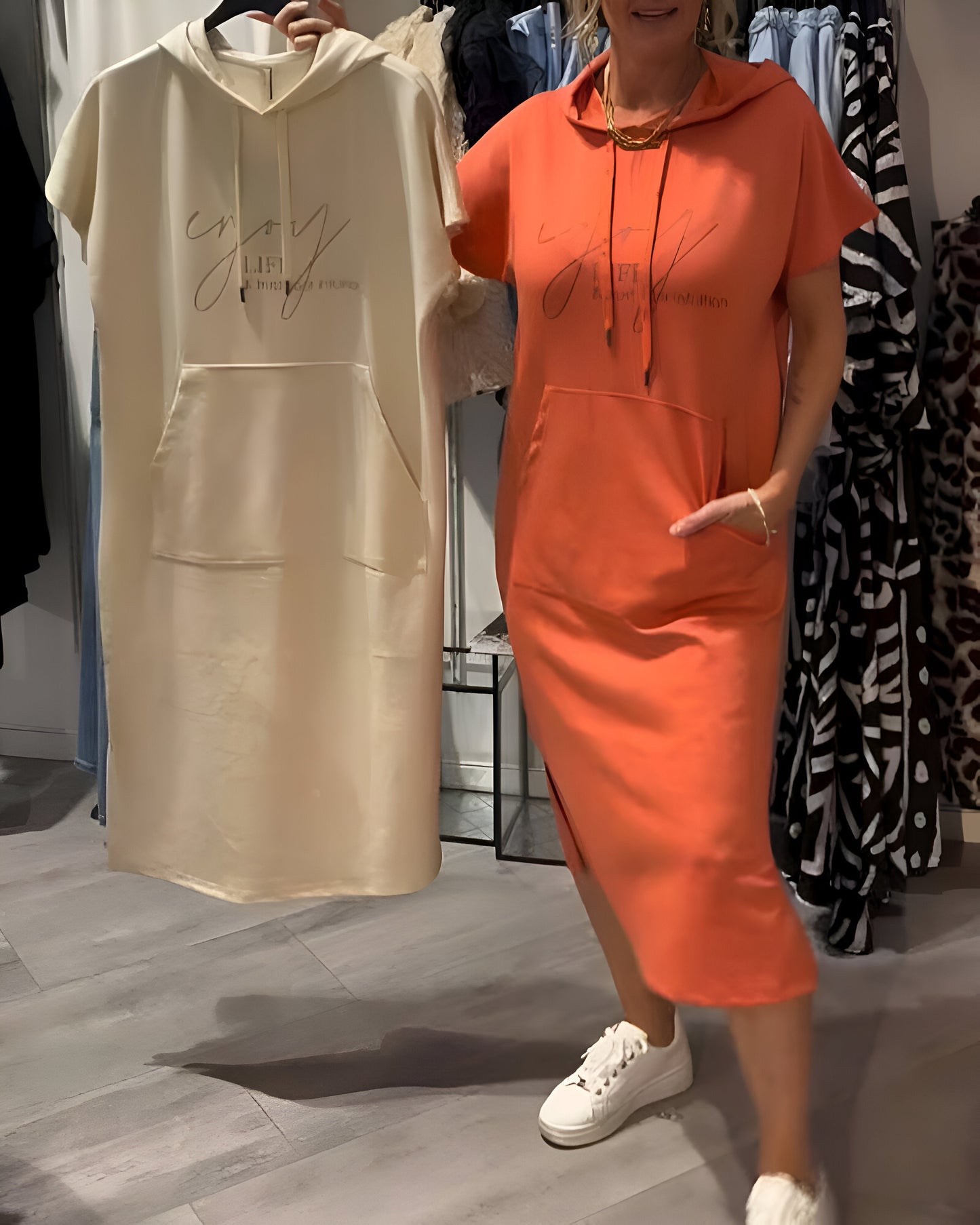 Vêtement de loisir avec capuchon