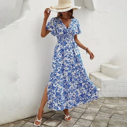 Robe longue avec encolure en V fleurie et manches courtes élégantes