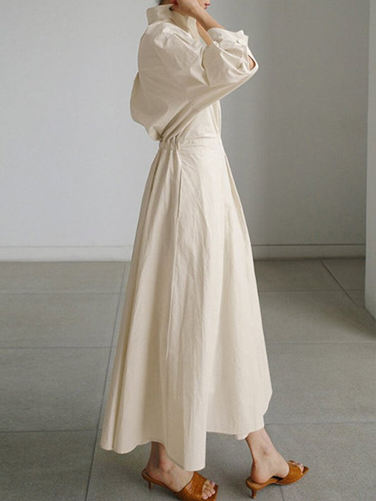 Robe longue élégante avec plissés sophistiqués