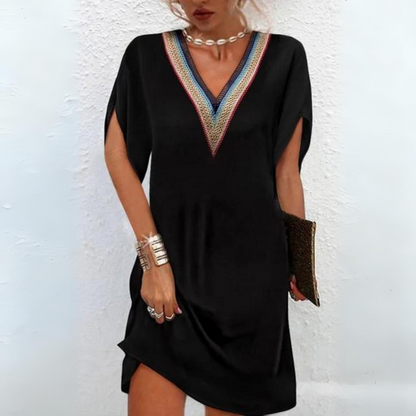 Annet - Robe élégante avec encolure en V brodée