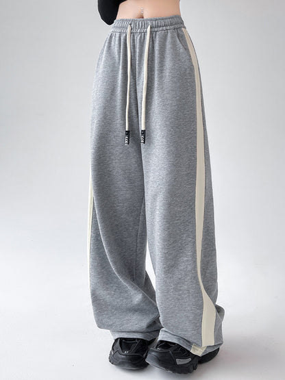 Pantalon de survêtement à jambes larges avec cordon de serrage et bordures contrastées