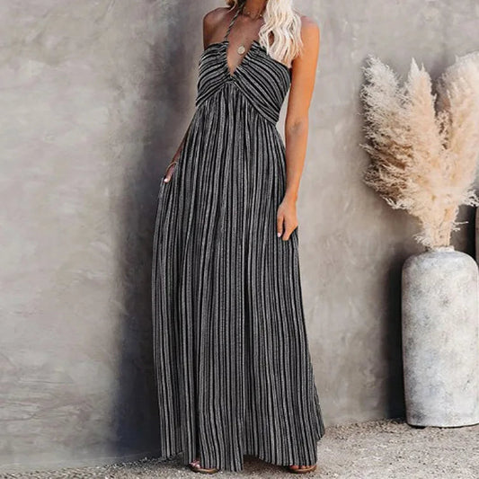 Robe longue rayée coupe trapèze avec décolleté plongeant et nœud dans le dos