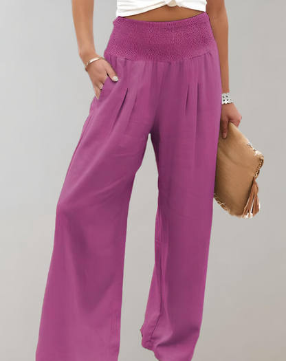 Amandine - Pantalon taille haute à jambes larges et pattes d'éléphant