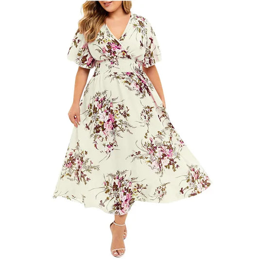 Longue robe féminine en mousseline fleurie