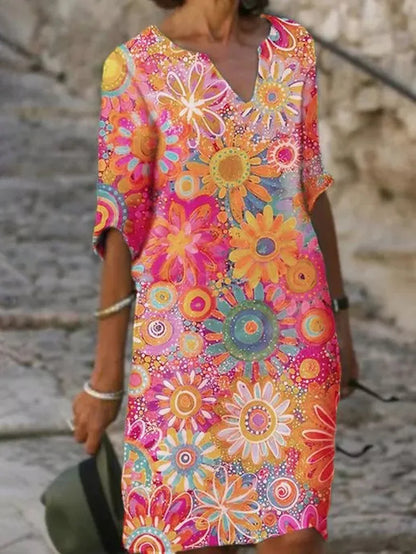 Robe midi à fleurs avec encolure en V et élégance intemporelle