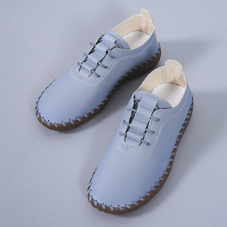 Chaussures plates à lacets en cuir souple et creux pour femmes
