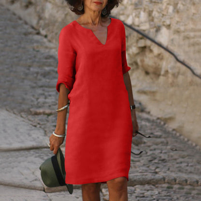 Robe classique élégante arrivant aux genoux avec manches trois-quarts