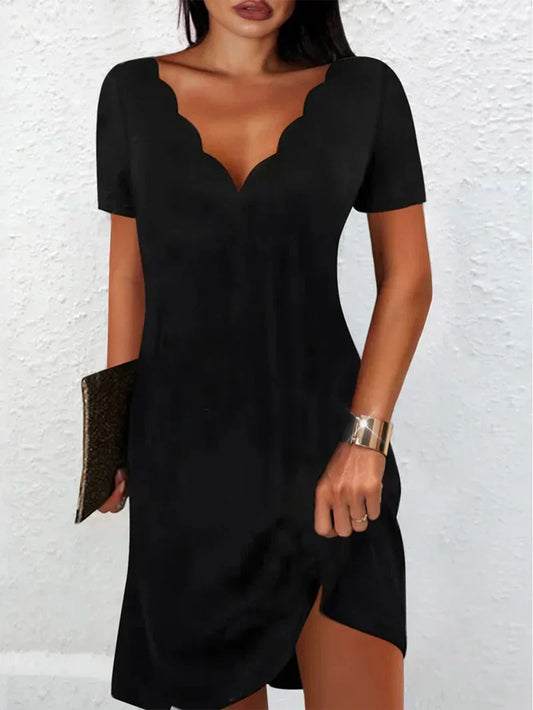 Suki - robe décontractée en maille avec col en V et manches courtes