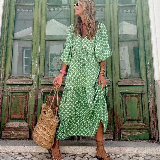 Taylor - Longue robe printanière à manches bouffantes