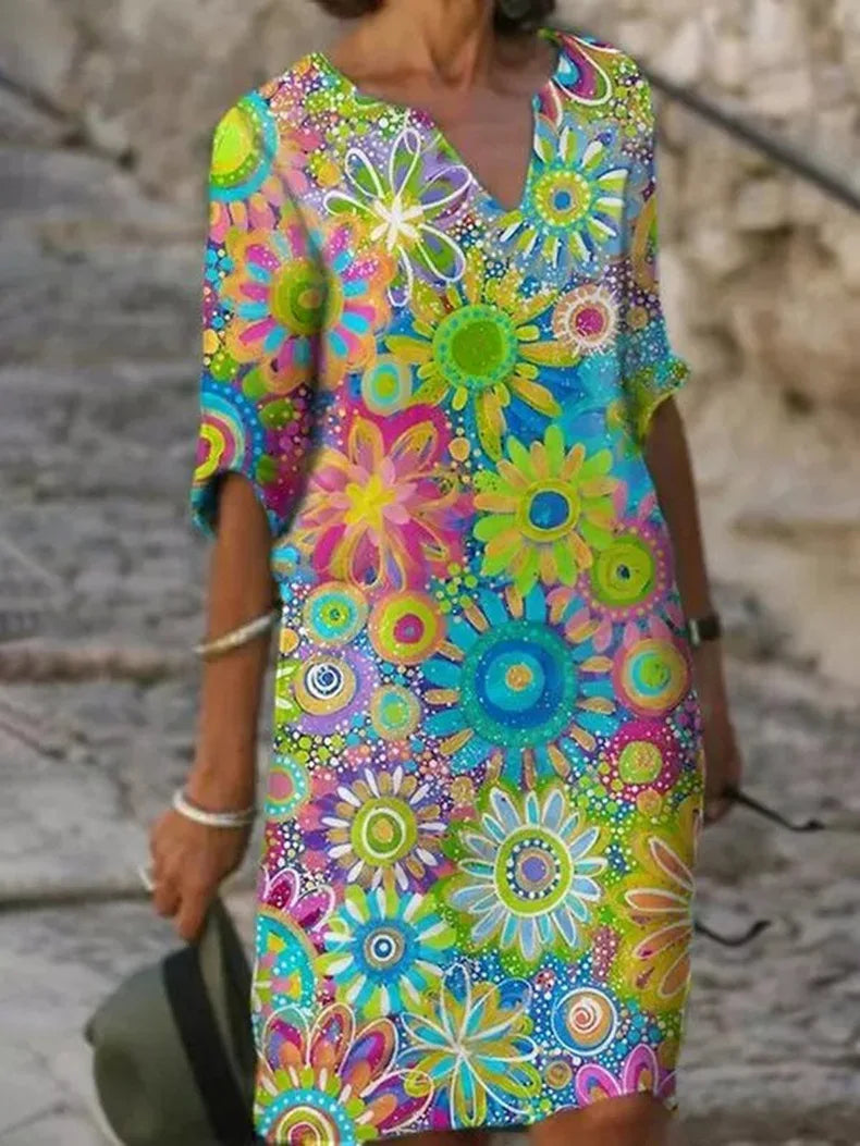 Robe midi à fleurs avec encolure en V et élégance intemporelle