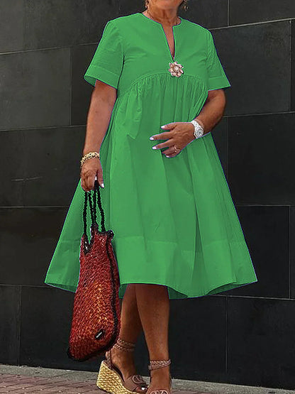 Daleyza - Robe midi unie avec broche florale