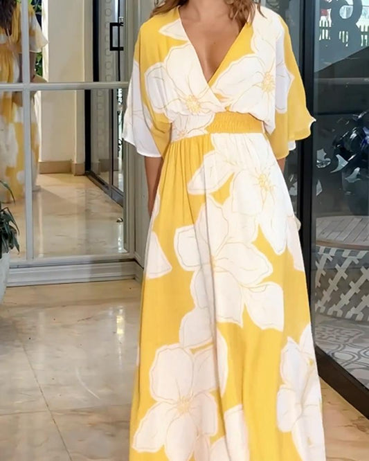 Robe longue à fleurs avec manches chauve-souris
